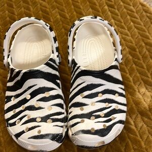 Crocs unisex zebra print, men’s 4, women’s 6.